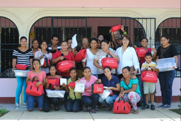 Proudly showing off their First Aid kits which were generously donated by the workers at the Bruce Nuclear Power Plant