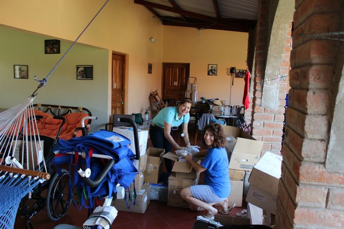 Dr. Silivia and Janice look through the container supplies. The NPH orphanage received many boxes of clothing, school supplies, dishes etc for the children. Dr. Silivia was thrilled with the four wheelchairs, walkers, canes, crutches, bandages, needles and many other much needed medical supplies that the NPH medical clinic received from the Canadian team. 