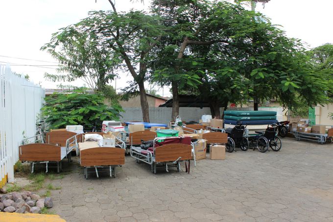 Ten hospital beds, donated by Spruce Lodge in Stratford, Ontario, wait to be brought into the hospital. People have been sleeping on bedsprings, very thin mattress, and broken beds at the Nandaime hospital. These beds were received with lots of joy