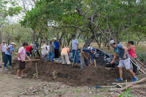Making compost for the gardens- 2020 Medical team members worked together with the people of Nandarola