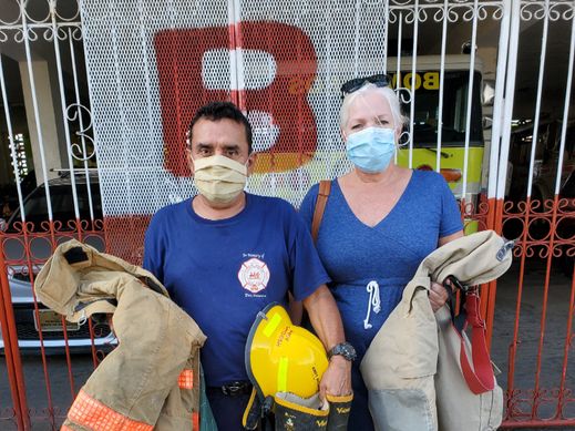 Rivas firefighters receiving firefighter gear. 