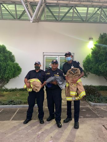Managua firefighters with their chief were over the moon happy with the donated turnout gear donated by Paisley Fire