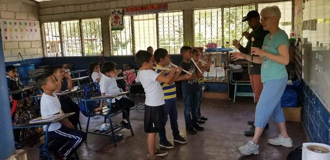 Our team member Beverly and translator Jhonny work with one of the school classes in San Luis 